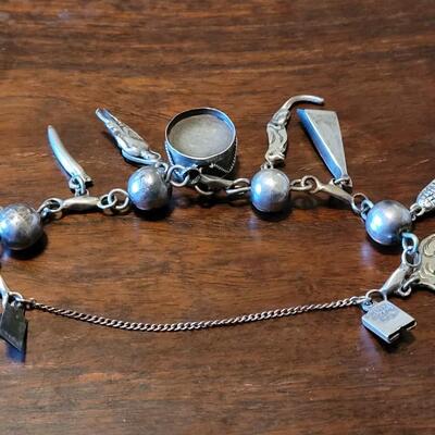 Lot 91: Vintage Mexican Mid Century Sterling Charm Bracelet