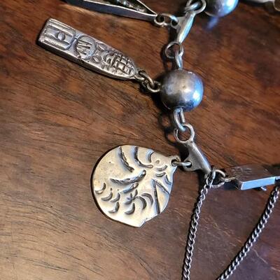 Lot 91: Vintage Mexican Mid Century Sterling Charm Bracelet