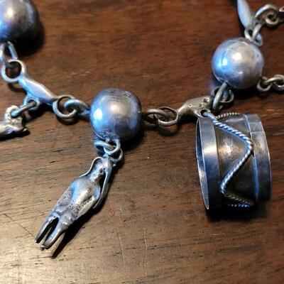 Lot 91: Vintage Mexican Mid Century Sterling Charm Bracelet