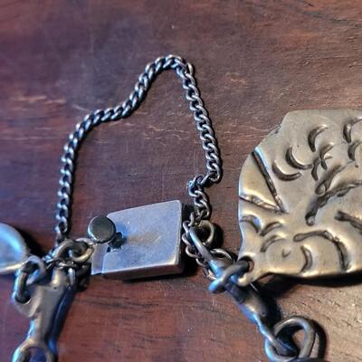 Lot 91: Vintage Mexican Mid Century Sterling Charm Bracelet