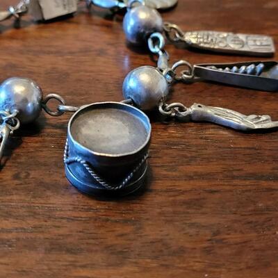 Lot 91: Vintage Mexican Mid Century Sterling Charm Bracelet
