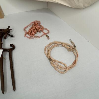 Misc glasses, tote, eyeglass holders, misc lawn spikes and plant type stakes, pot