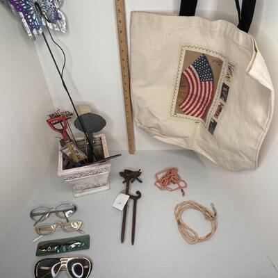 Misc glasses, tote, eyeglass holders, misc lawn spikes and plant type stakes, pot