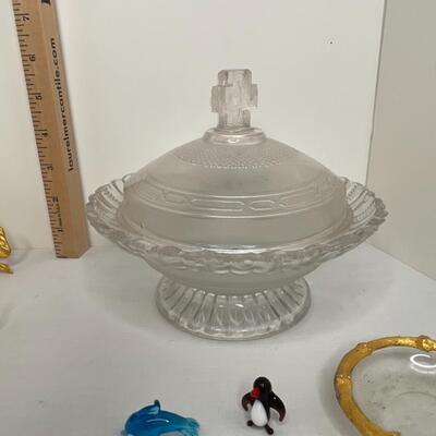 Metalware, napkin rungs, saucers, miniature animals, glass dish with lid
