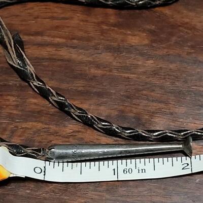 Lot 109: Vintage Navajo Sterling and Turquoise Bolo Tie and Extra Bolo Woven Leather String