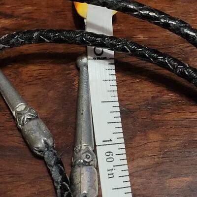 Lot 109: Vintage Navajo Sterling and Turquoise Bolo Tie and Extra Bolo Woven Leather String