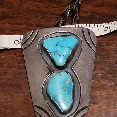 Lot 109: Vintage Navajo Sterling and Turquoise Bolo Tie and Extra Bolo Woven Leather String