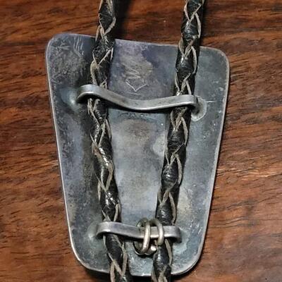 Lot 109: Vintage Navajo Sterling and Turquoise Bolo Tie and Extra Bolo Woven Leather String