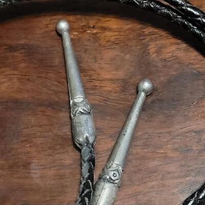 Lot 109: Vintage Navajo Sterling and Turquoise Bolo Tie and Extra Bolo Woven Leather String