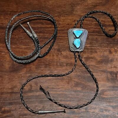 Lot 109: Vintage Navajo Sterling and Turquoise Bolo Tie and Extra Bolo Woven Leather String