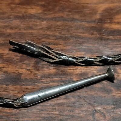 Lot 109: Vintage Navajo Sterling and Turquoise Bolo Tie and Extra Bolo Woven Leather String