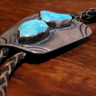 Lot 109: Vintage Navajo Sterling and Turquoise Bolo Tie and Extra Bolo Woven Leather String