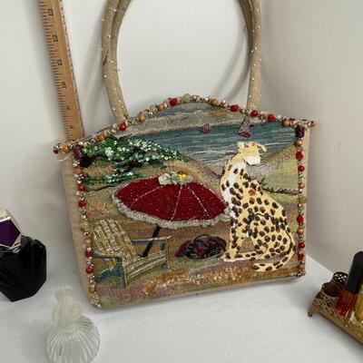 Trinket boxes, perfume holder, talcum shaker, purse, perfumes