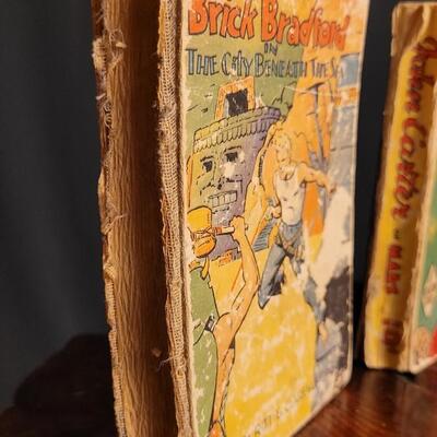 Lot 154: (2) Vintage Hardback Action Books