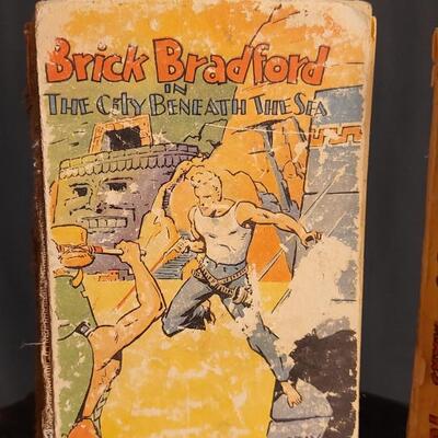 Lot 154: (2) Vintage Hardback Action Books