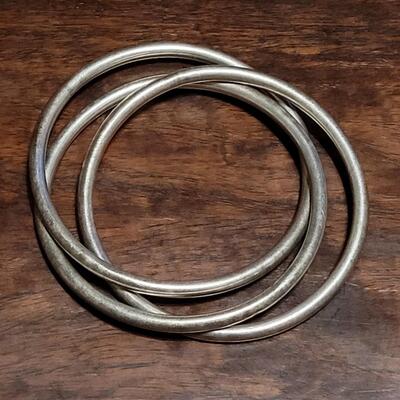 Lot 165: TAXCO (3) Intertwined Sterling Bangles