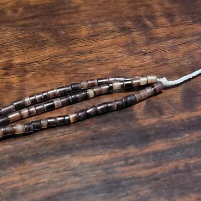 Lot 169: Old Pawn Triple Strand Santo Domingo Heishi Bead String Tied Necklace
