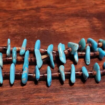 Lot 169: Old Pawn Triple Strand Santo Domingo Heishi Bead String Tied Necklace