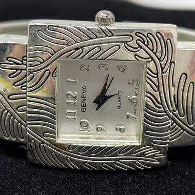 GENEVA QUARTZ SILVER TONED CUFF WATCH - WORKS!