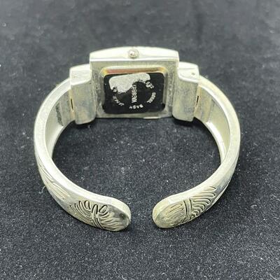 GENEVA QUARTZ SILVER TONED CUFF WATCH - WORKS!
