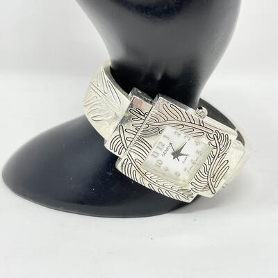 GENEVA QUARTZ SILVER TONED CUFF WATCH - WORKS!