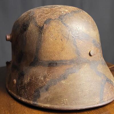 Lot 219: Antique German Imperial Military M16 Hand Pained Camouflage Helmet