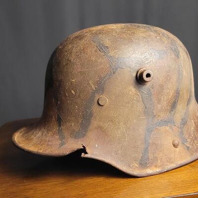 Lot 219: Antique German Imperial Military M16 Hand Pained Camouflage Helmet
