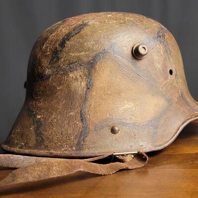 Lot 219: Antique German Imperial Military M16 Hand Pained Camouflage Helmet