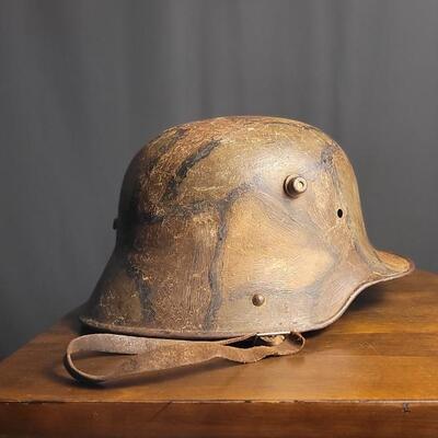 Lot 219: Antique German Imperial Military M16 Hand Pained Camouflage Helmet
