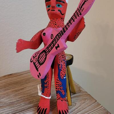 Lot 245: Mexican Handpainted Wood Folk Art Devil Playing the Guitar
