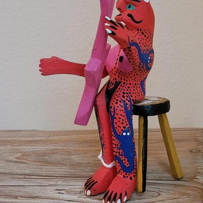 Lot 245: Mexican Handpainted Wood Folk Art Devil Playing the Guitar