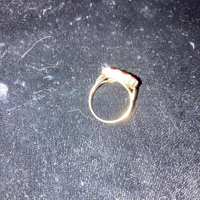 Gold Horseshoe Ring with Diamonds and Rubies