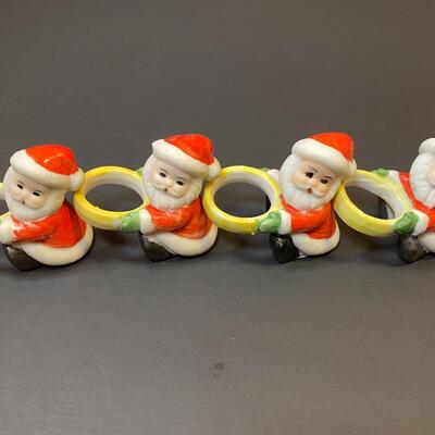 Lot 477: Vintage Japan Christmas Table: Salt/Pepper Sets, Candle Huggers & Holders, Napkin Rings