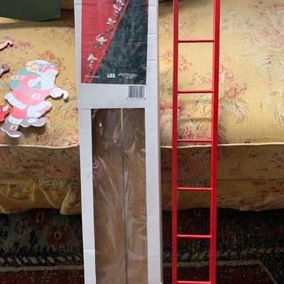 Santa and elves on ladder