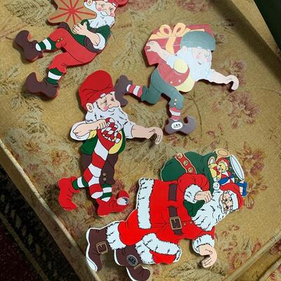 Santa and elves on ladder