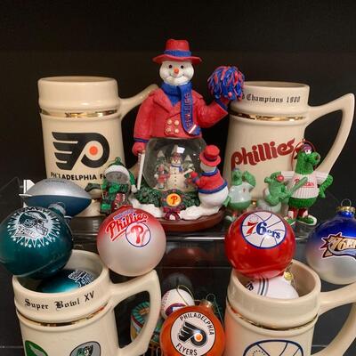 Lot 499: Sports Team Steins, Phillies Snowglobe  & Ornaments