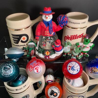 Lot 499: Sports Team Steins, Phillies Snowglobe  & Ornaments