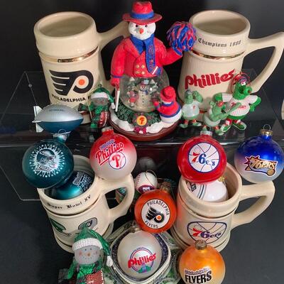 Lot 499: Sports Team Steins, Phillies Snowglobe  & Ornaments