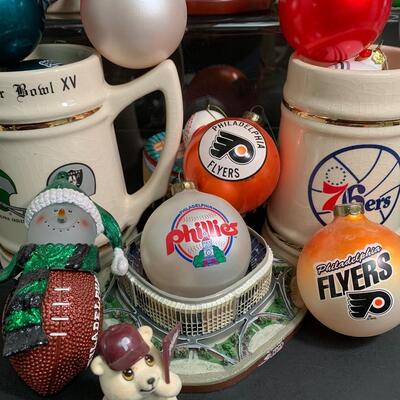 Lot 499: Sports Team Steins, Phillies Snowglobe  & Ornaments