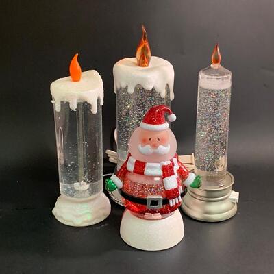 Lot 375: Coloring Changing Candles and Santa Snowglobe