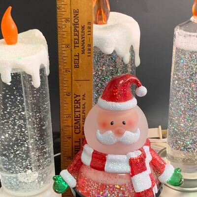 Lot 375: Coloring Changing Candles and Santa Snowglobe