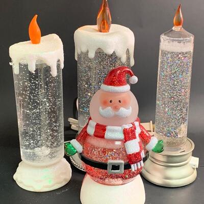 Lot 375: Coloring Changing Candles and Santa Snowglobe