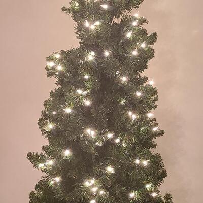 Lot 513: Five Foot Tall Pre-Lit Holiday Tree in Metal Stand