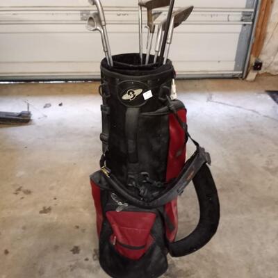 black and red gold bag with clubs