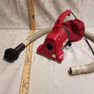 Dirt Devil handheld vac, decent suction