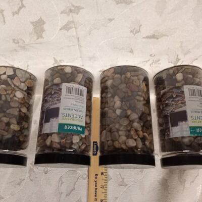 4 jars pebbles, black lids