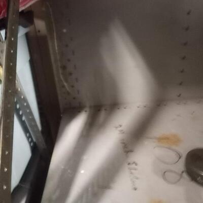 large industrial metal shelf, with solid back and right side