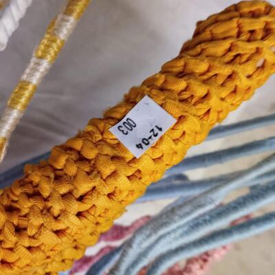 lot of vintage crochet covered clothes hangers