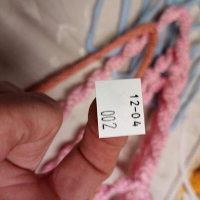 lot of vintage crochet covered clothes hangers