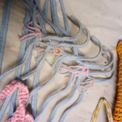 lot of vintage crochet covered clothes hangers